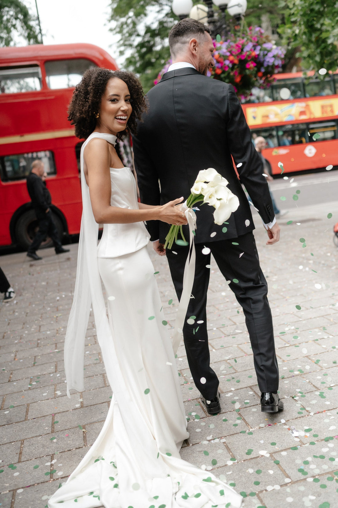 long wedding with corset bustier and scarf on bride with kinky curly hair