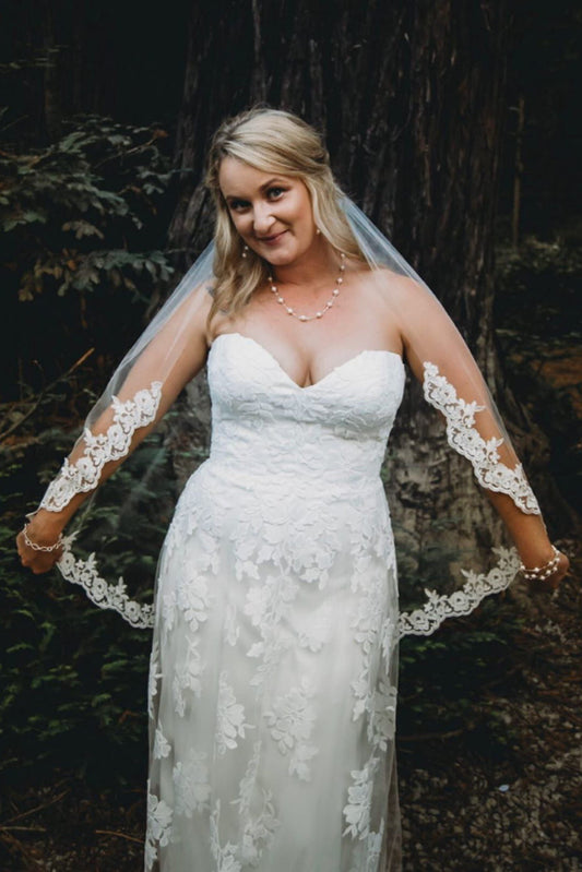 romantic floral lace edge fingertip wedding veil with sweetheart neckline wedding dress