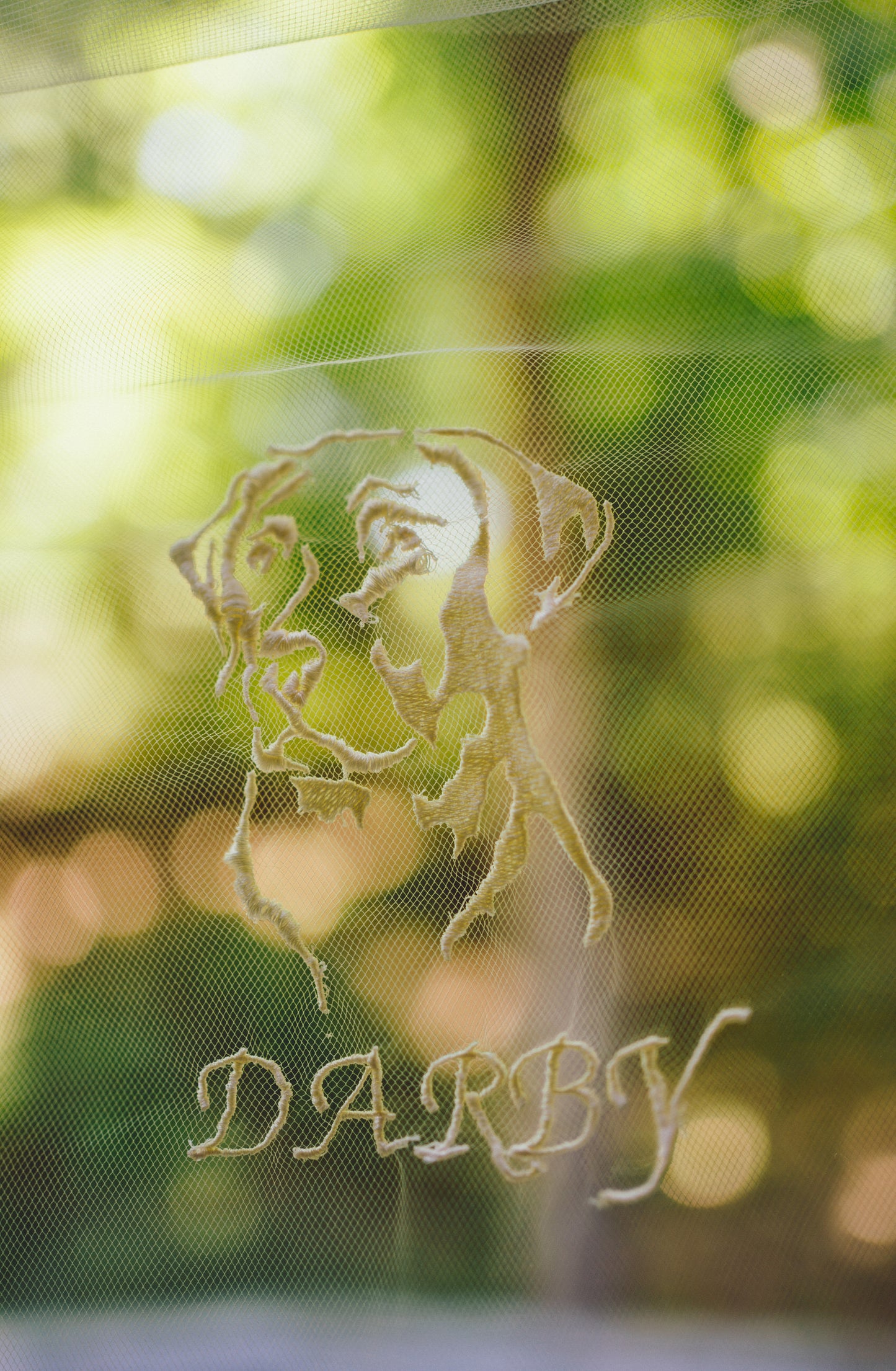 unique custom embroidery of lab dog in ivory thread on tulle bridal veil