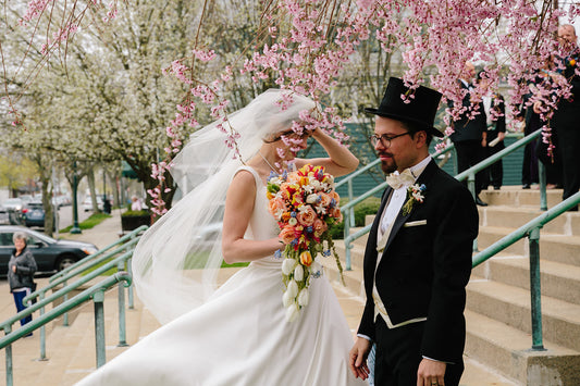 double layer blusher wedding veil on bride and groom in historical top hat