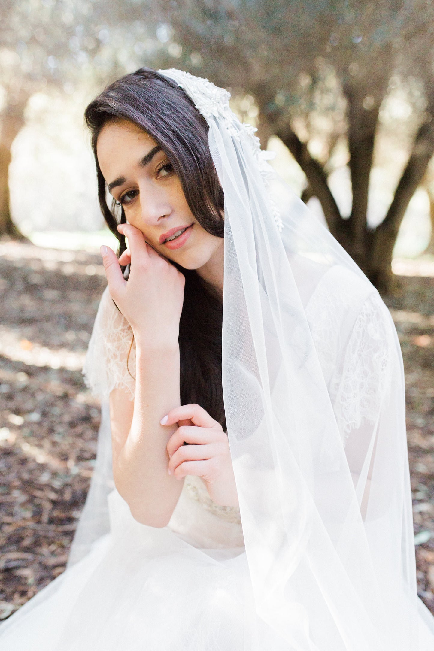 bride showing how to repurpose and redesign her Grandma's wedding dress