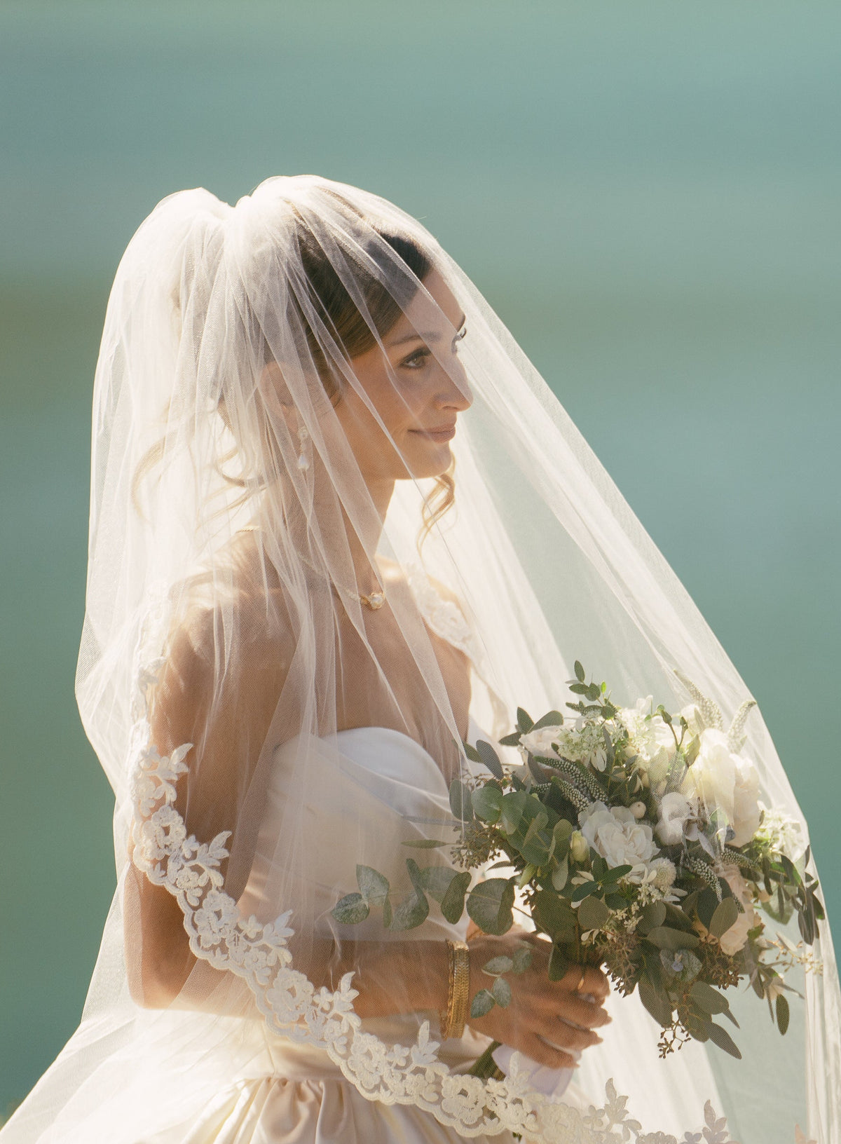 blusher bridal veil with trim of lace over bun