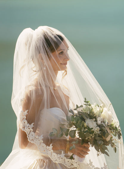 blusher bridal veil with trim of lace over bun