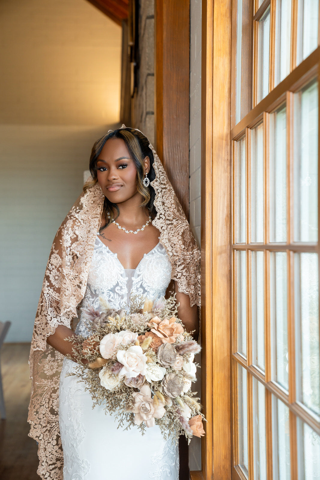 gold mantilla bridal veil cathedral length made from embroidered lace