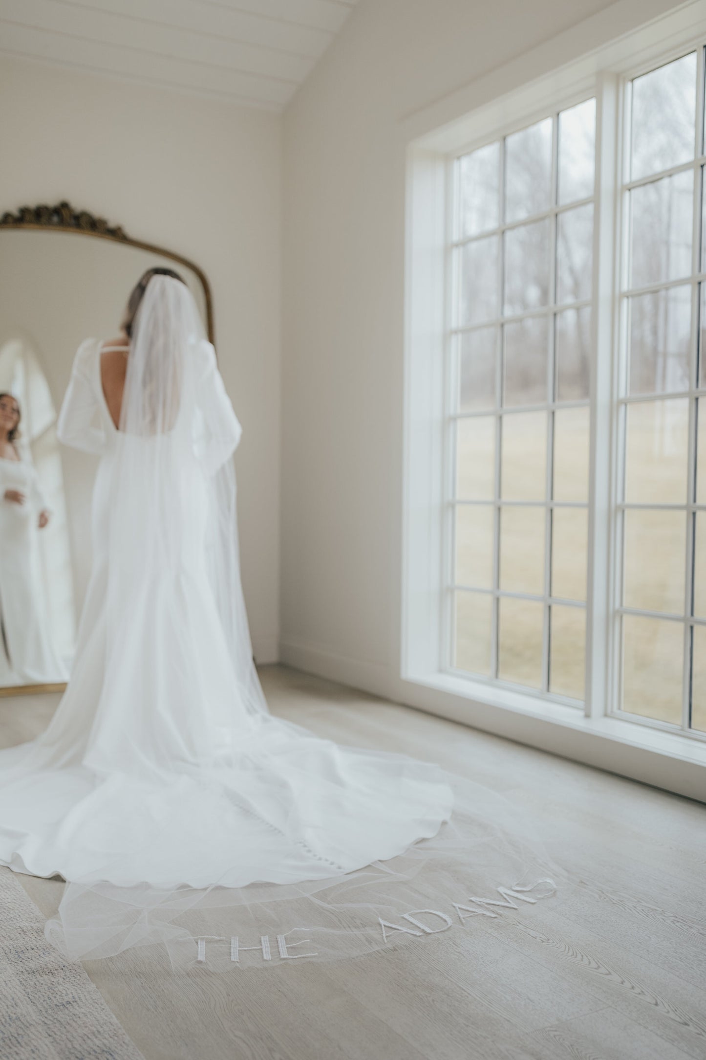elegant simple long wedding. veil with embroidery new last name on bottom in light ivory