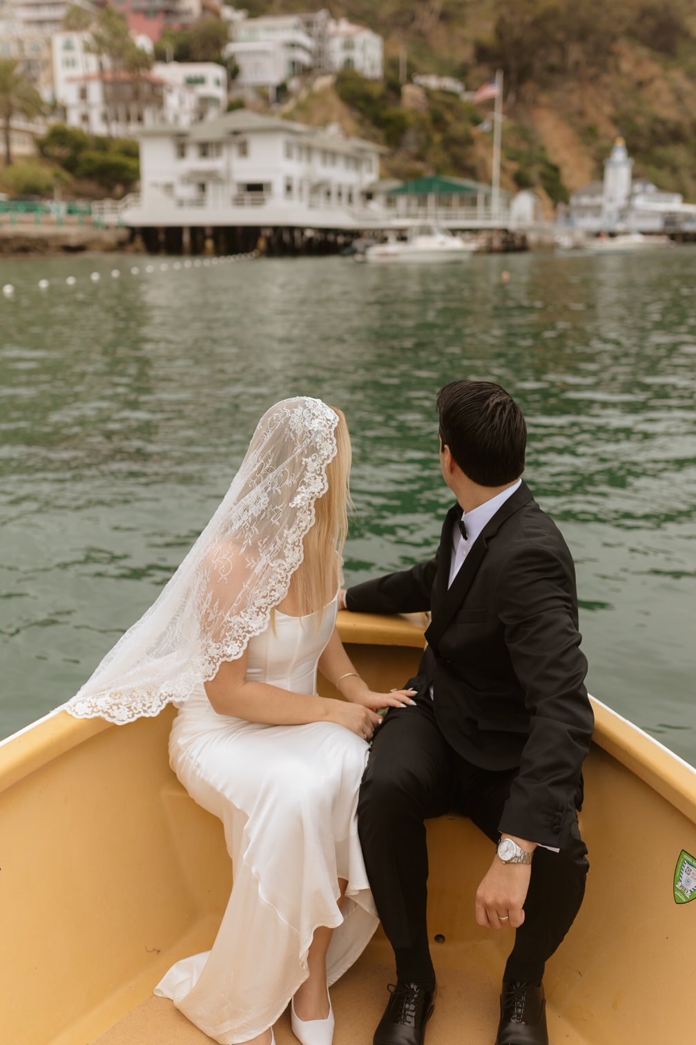 simple corset wedding dress with knee length white lace mantilla bridal veil