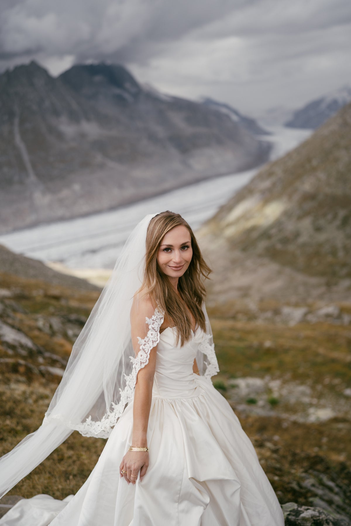 long blusher veil with trim and sweetheart neckline gown