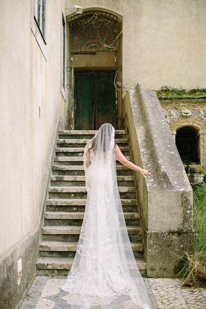 long royal lace mantilla bridal veil for spanish bride with downdo curled hair