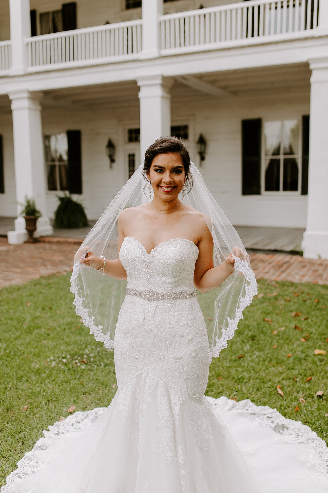 classic fingertip length wedding veil with mermaid dress