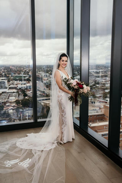 bold monogram raw edge veil for winter wedding